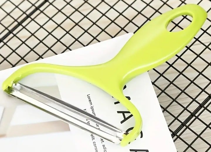 "New" Multifunctional Stainless-Steel Fruit and Vegetable Peeler              14